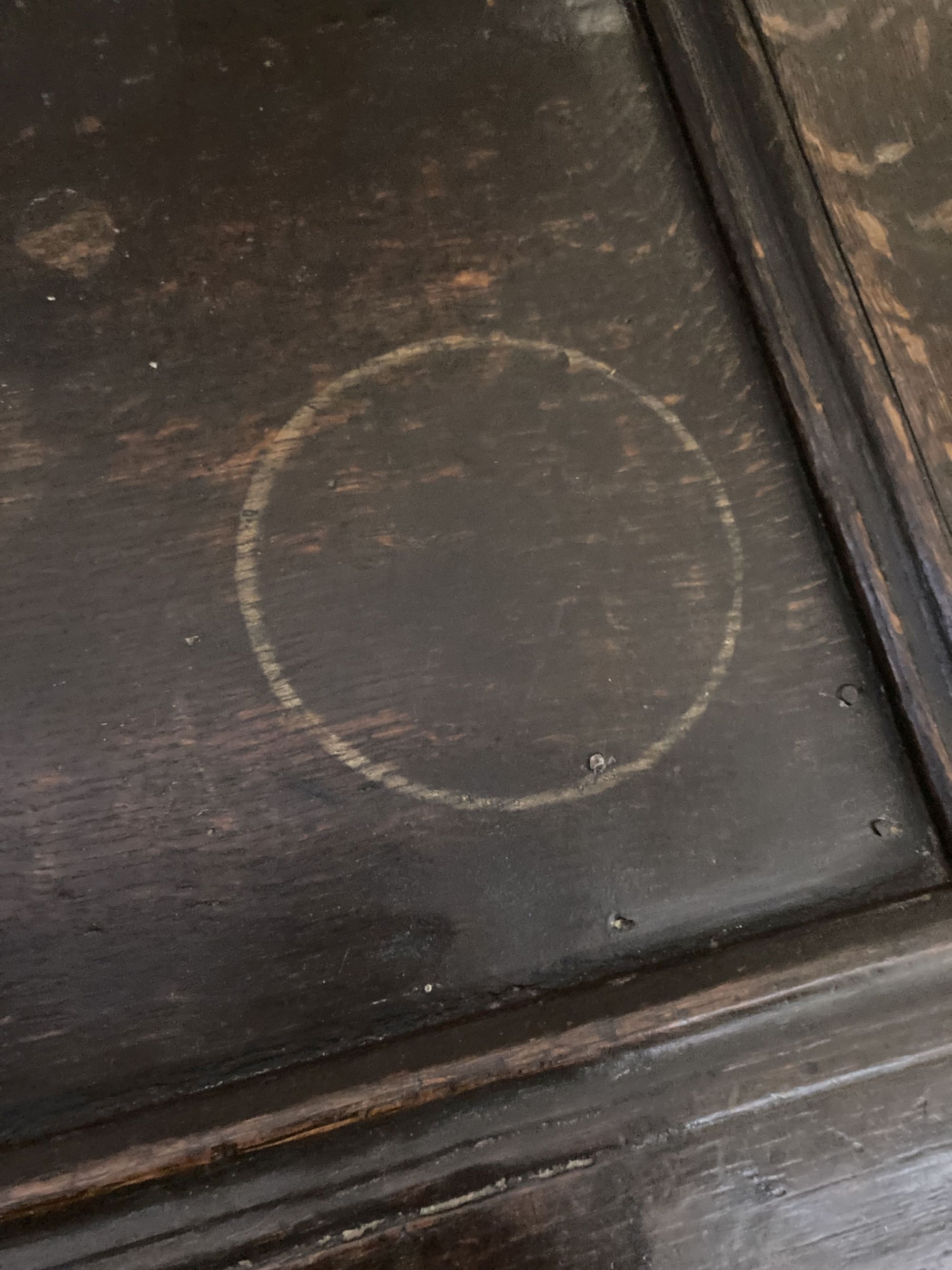 An 18th century carved oak coffer with twin panelled front, width 125cm, depth 55cm, height 75cm